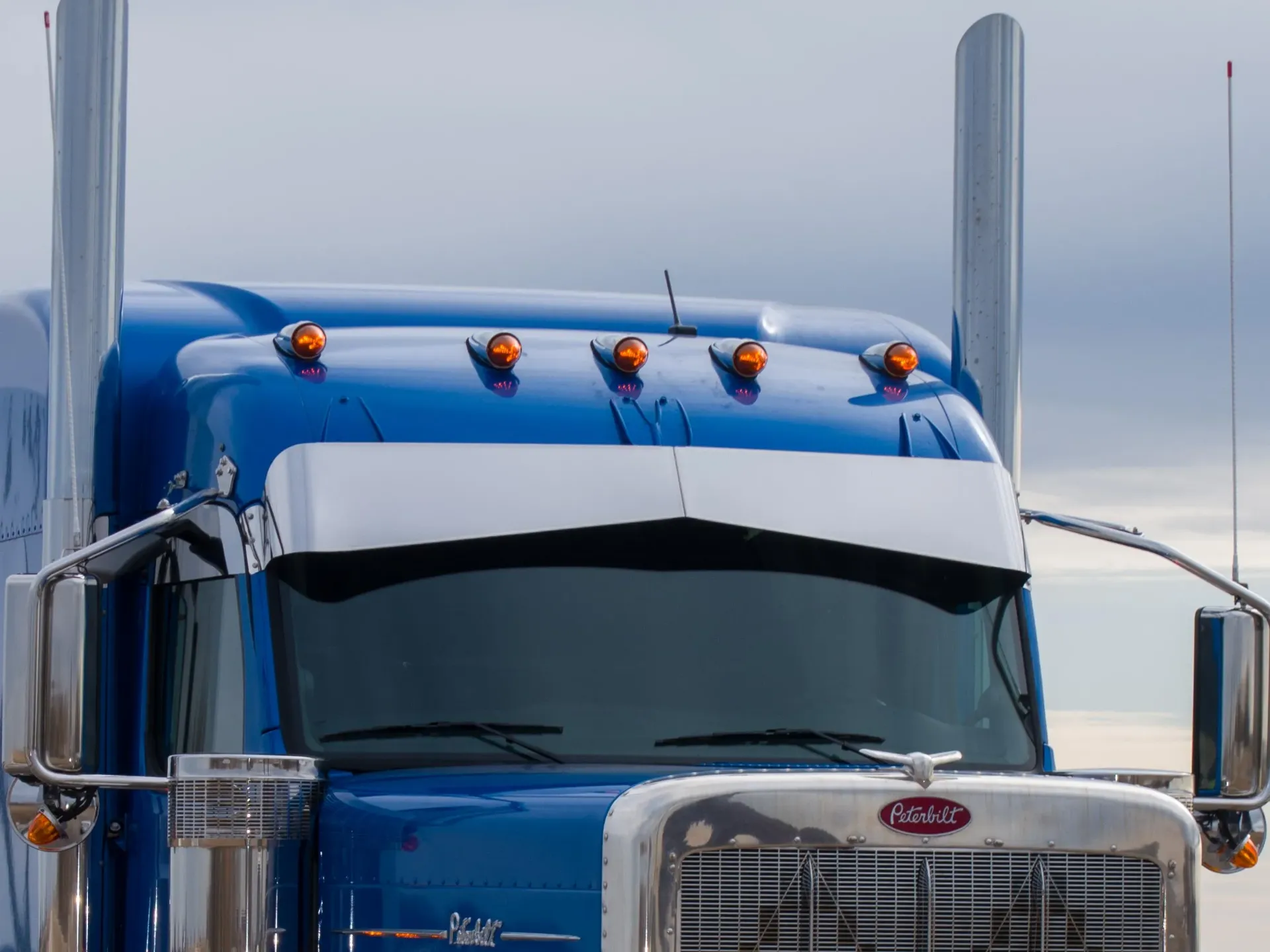 [SLI003017] Peterbilt 589 High Rise Visors - Factory Mounts (12" Straight, No Light Holes)